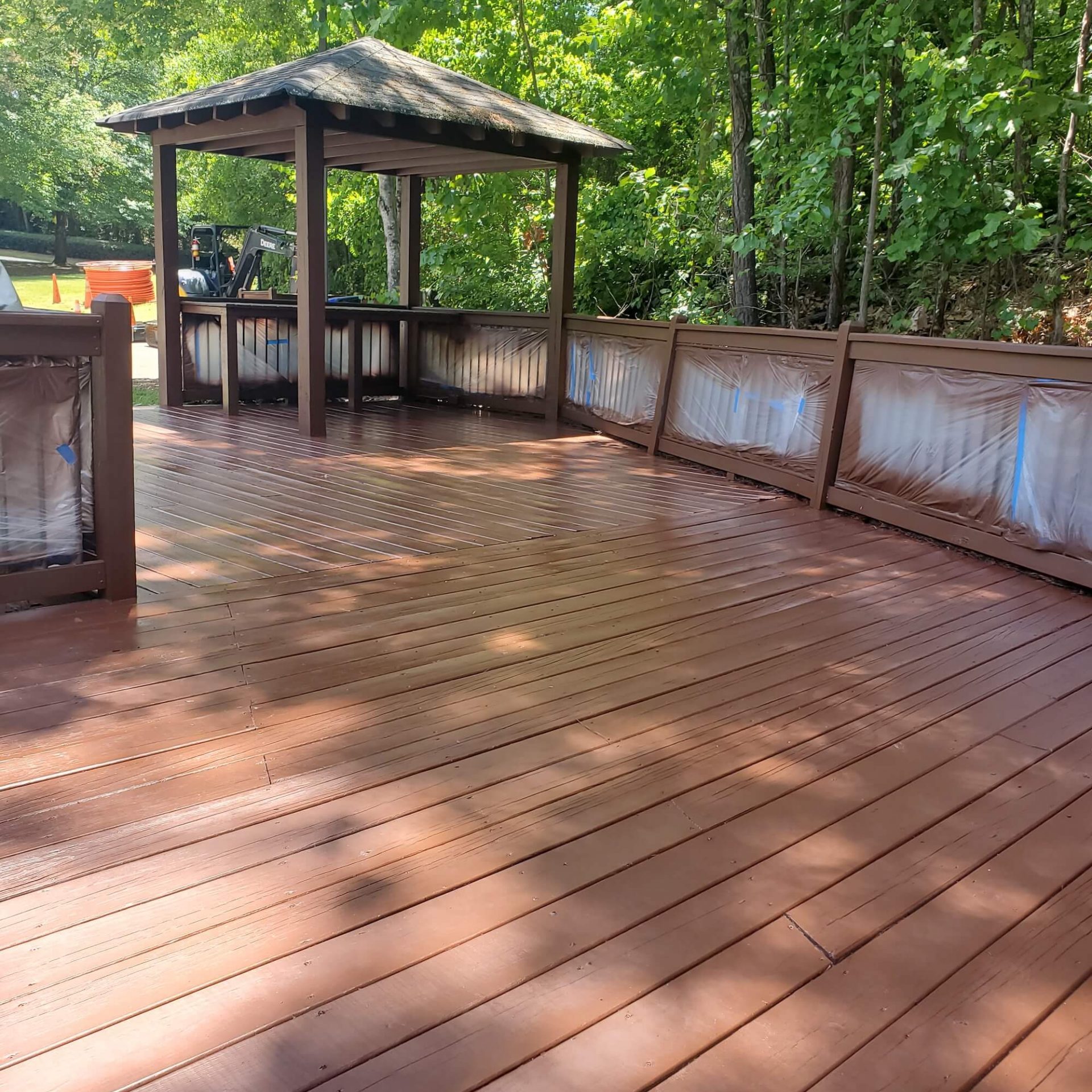 professionally painted and stained wood deck in lawrenceville